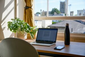 Self-employed professional working from home on mortgage paperwork in Austin Texas