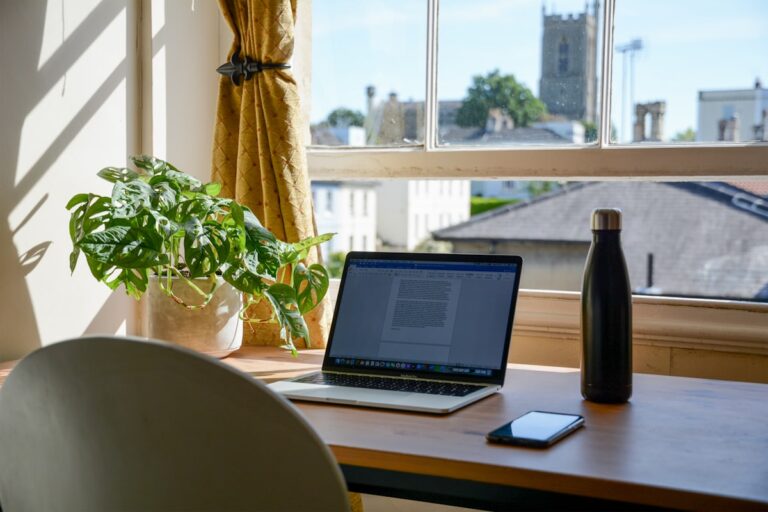 Self-employed professional working from home on mortgage paperwork in Austin Texas