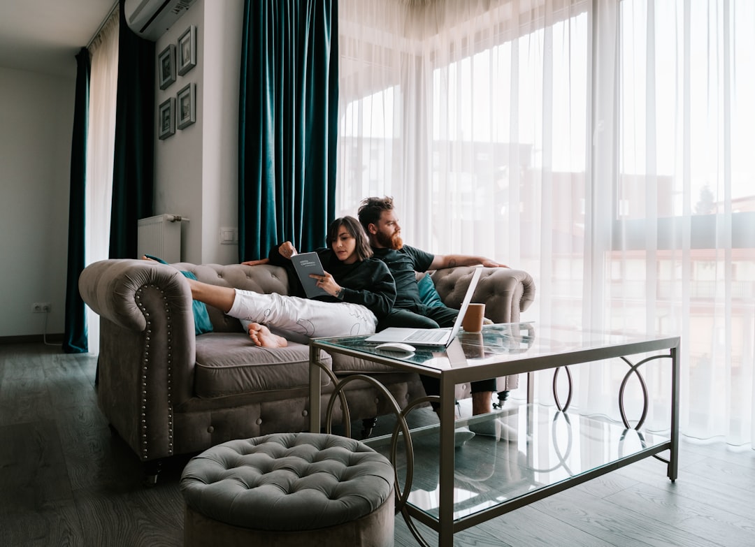 First-time homebuyers touring a house in Austin with their agent before making an offer