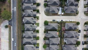 Aerial view of a suburban neighborhood like those buyers see when buying a home in Georgetown, Texas