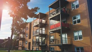 Four unit brick apartment building of the kind subject to the FHA self-sufficiency test in Austin