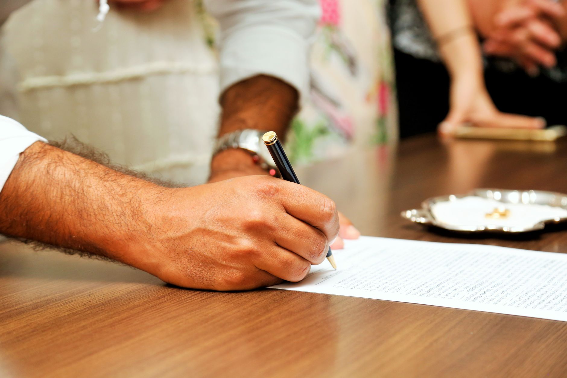 Signing home loan documents by power of attorney at an Austin closing